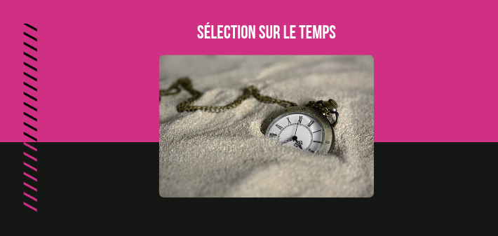 Une montre à  gousset dans du sable